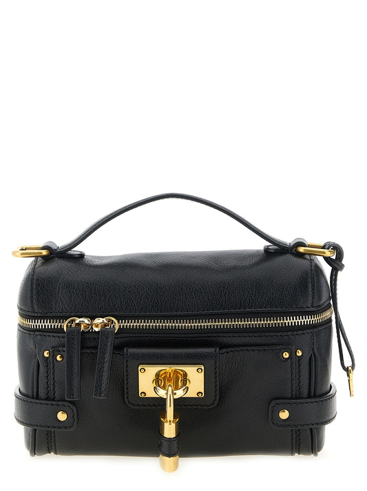 Shoulder Travel Bag by Chloé for women in buffalo leather black & gold presents a versatile silhouette, showcasing a secure and versatile built-in-compartments with versatile shoulder-strap, handle & adjustable-strap for a sophisticated look.