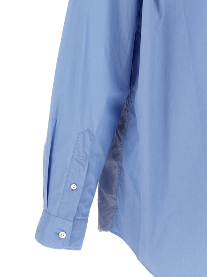 Shirt by Comme Des Garçons for men in cotton canvas light-blue & patchwork, featuring a nuanced and nuanced for a sophisticated finish.