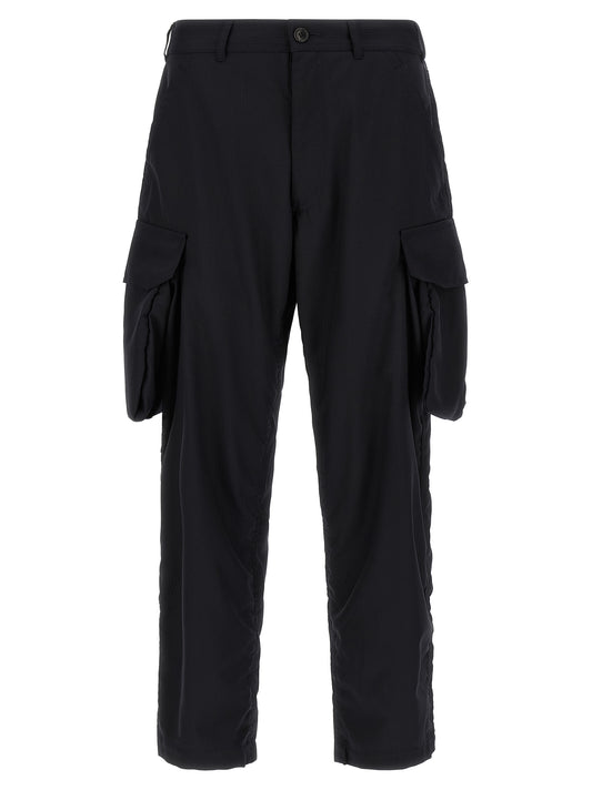 Cargo Pants by Comme Des Garçons for men in wool & polyester blue features an smart casual oversized and long, expertly tailored with a and smart casual utilitarian details for a sophisticated look.