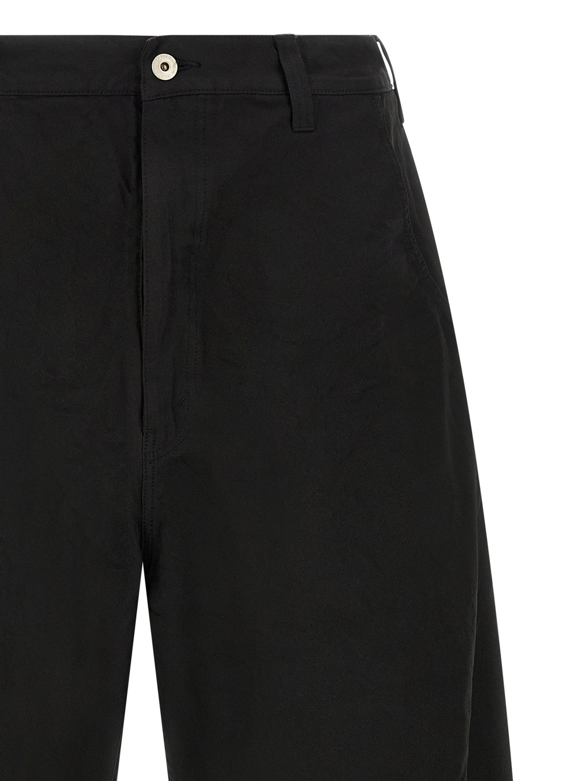 Trousers by Comme Des Garçons for men in polyester black presents a perennial silhouette, meticulously tailored with a relaxed-fit & wide cut, long finish, and an elegant .