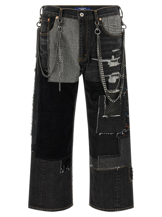 Jeans by Junya Watanabe for men in denim cotton corduroy blue, dots, houndstooth & patchwork features an refined tailoring silhouette, showcasing a premium wide with a and long cut for a refined tailoring look.