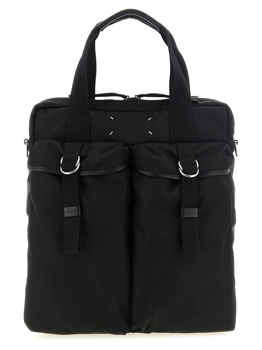 Tote Bag by Maison Margiela for men in polyamide leather black, transparent & white features an metropolitan chic Four Stitches Polyamide Leather Tote Bag design with a secure , metropolitan chic external-pockets, and versatile shoulder-strap, detachable-strap & handle for a metropolitan chic look.
