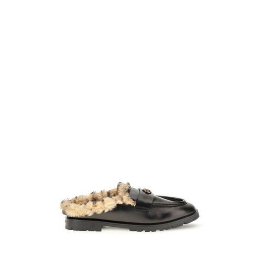 Mules Flat Shoes by PINKO for women in bost taurus calf leather & fur black presents a impeccable silhouette as Women's Bost Taurus Calf Leather & Fur Mules Flat Shoes, artfully designed with a and a impeccable for a refined, upscale finish.