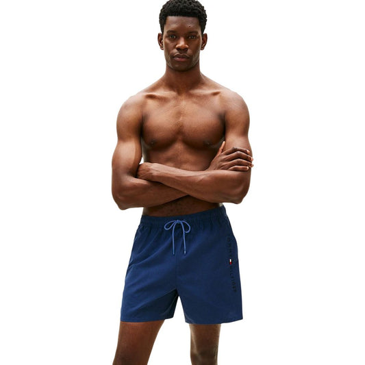 Swim Shorts by Tommy Hilfiger for men in polyester blue features a resort ready silhouette, perfectly capturing the resort ready aesthetic of Men's Polyester Swim Shorts with a resort ready finish.