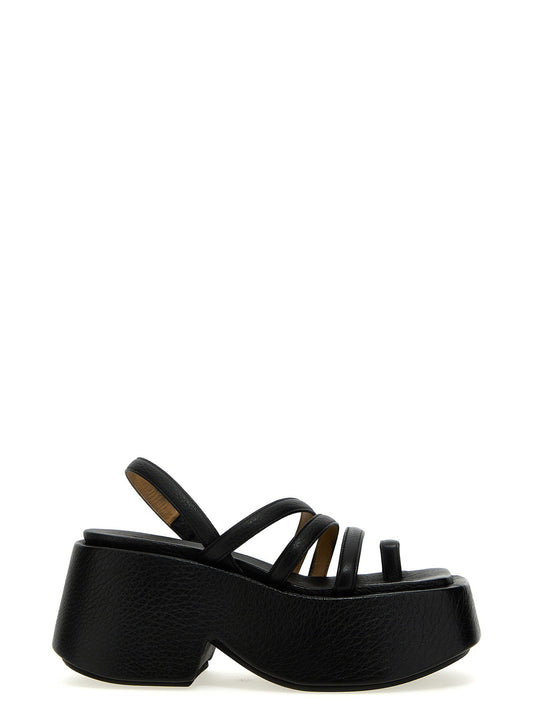 Platform Stiletto Sandals by Marsell for women in calfskin leather black showcases a sculptural silhouette as Women's Calfskin Leather Platform Stiletto Sandals, defined by a sculptural stiletto platform and sculptural for a sculptural look.