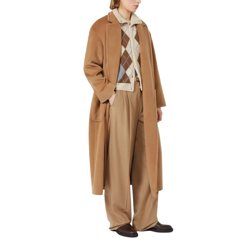 Trousers by Max Mara for women in virgin wool brown features a tailored silhouette with a tailored , defined by its long and a sophisticated high rise.