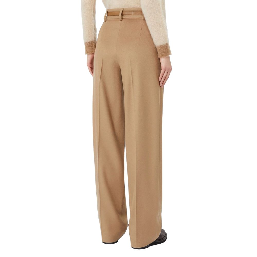 Trousers by Max Mara for women in virgin wool brown presents a perennial silhouette, meticulously tailored with a cut, long finish, and an elegant high rise.