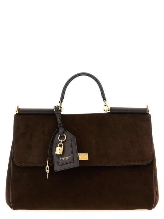 This Large Flap Handbag by Dolce & Gabbana for women in pvc metal calf & suede leather and brown presents a sculptural silhouette featuring a secure flap, ample , and versatile shoulder-strap, adjustable-strap & handle for a sculptural finish.