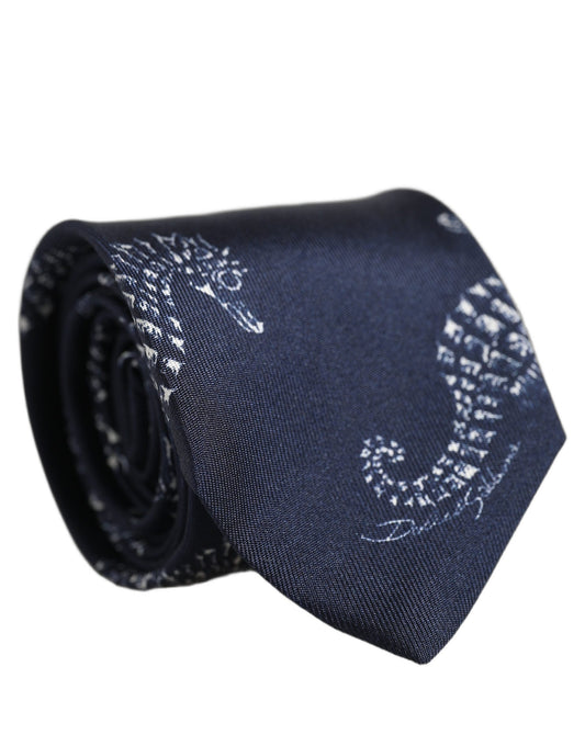 Necktie by Dolce & Gabbana for men in silk dark-blue, white, patterned & print features an stately silhouette that beautifully highlights the sophisticated style of the Silk Necktie.