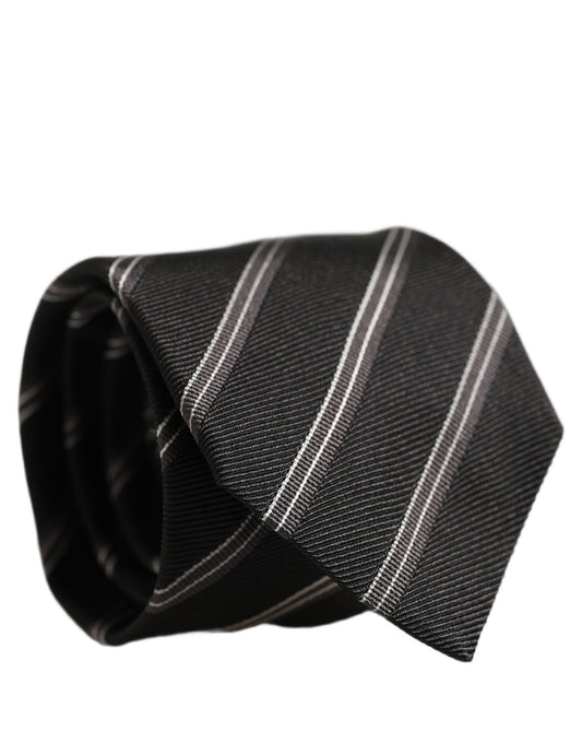 Necktie by Dolce & Gabbana for men in polyester & silk black, gray, white & striped features a distinguished silhouette, artfully capturing the essence of the distinguished Polyester & Silk Necktie design for a sophisticated look.