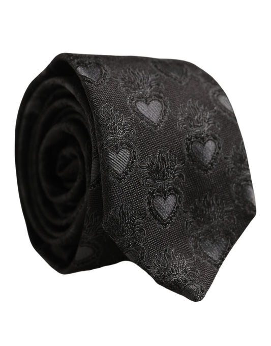 Necktie by Dolce & Gabbana for men in silk black, patterned & jacquard features a sun-drenched silhouette, showcasing the sun-drenched design of this Heart Silk Necktie with a sun-drenched finish.