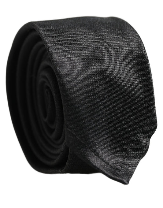 Necktie by Dolce & Gabbana for men in silk satin black features an stately silhouette that beautifully highlights the sophisticated style of the Silk Satin Necktie.