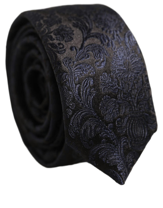 Necktie by Dolce & Gabbana for men in silk dark-blue, patterned, paisley, floral & jacquard showcases a stately silhouette, expertly detailed with a stately finish that perfectly captures the sophisticated essence of the Silk Necktie.