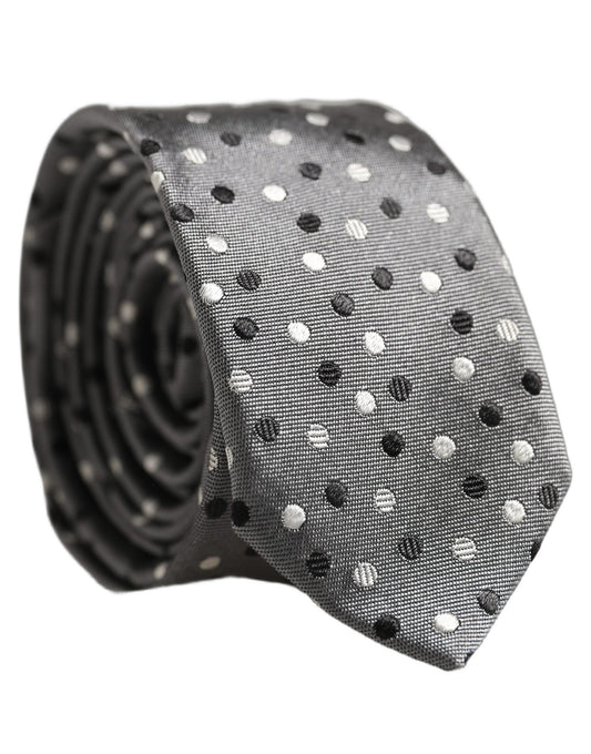 Necktie by Dolce & Gabbana for men in silk gray showcases a stately silhouette, expertly detailed with a stately finish that perfectly captures the sophisticated essence of the Silk Necktie.