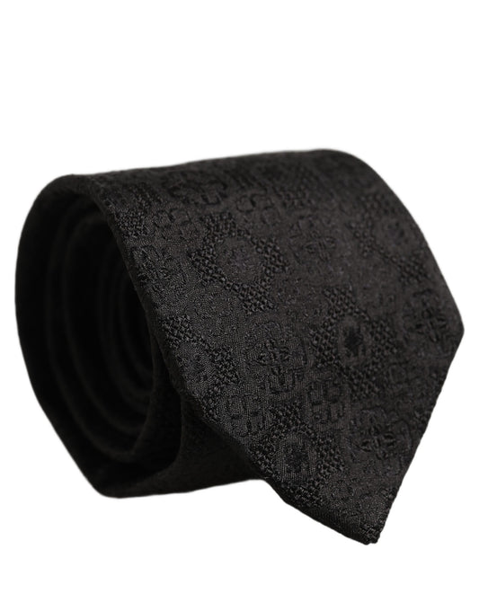 Necktie by Dolce & Gabbana for men in polyester & silk black, patterned & jacquard features an stately silhouette that beautifully highlights the sophisticated style of the Polyester & Silk Necktie.