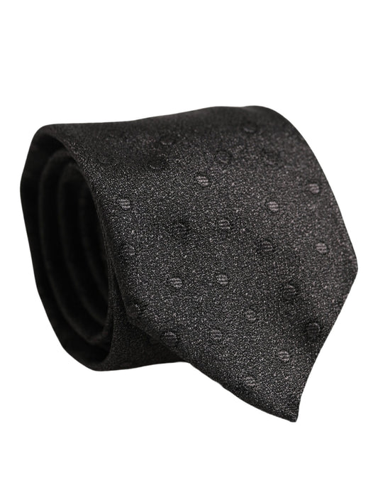 Necktie by Dolce & Gabbana for men in polyester & silk black & jacquard showcases a stately silhouette, expertly detailed with a stately finish that perfectly captures the sophisticated essence of the Polyester & Silk Necktie.