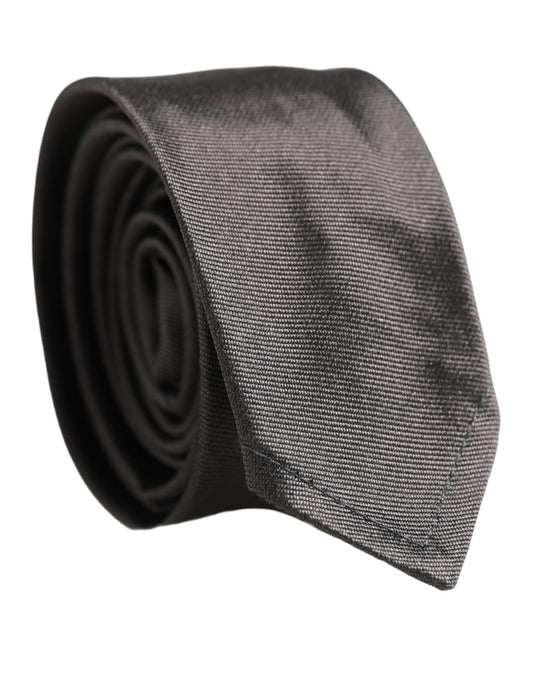 Necktie by Dolce & Gabbana for men in silk black features a distinguished silhouette, perfectly showcasing the distinguished details of Silk Necktie.