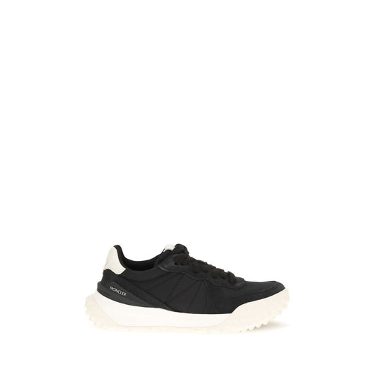 Athletic Sneakers by Moncler for women in eva tu polyamide suede leather black & ivory showcases a architectural silhouette, artfully capturing the essence of the City Women's Low Top EVA TU Polyamide Suede Leather Athletic Sneakers with its signature architectural low-top style construction.