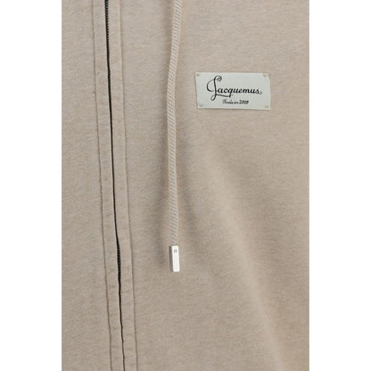 Sweatshirt Hoodie by Jacquemus for men in cotton beige features an dramatic silhouette, showcasing a sophisticated and dramatic for a refined, modern aesthetic.