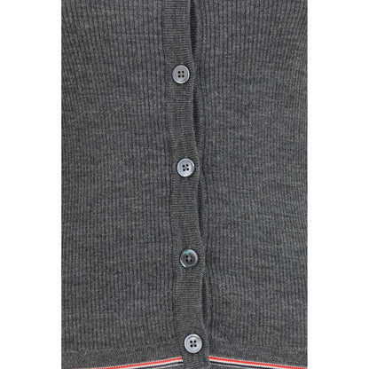Cardigan by Thom Browne for women in merino wool gray, signature & striped features a dramatic silhouette, showcasing a sophisticated and dramatic detail for a timeless, premium look.