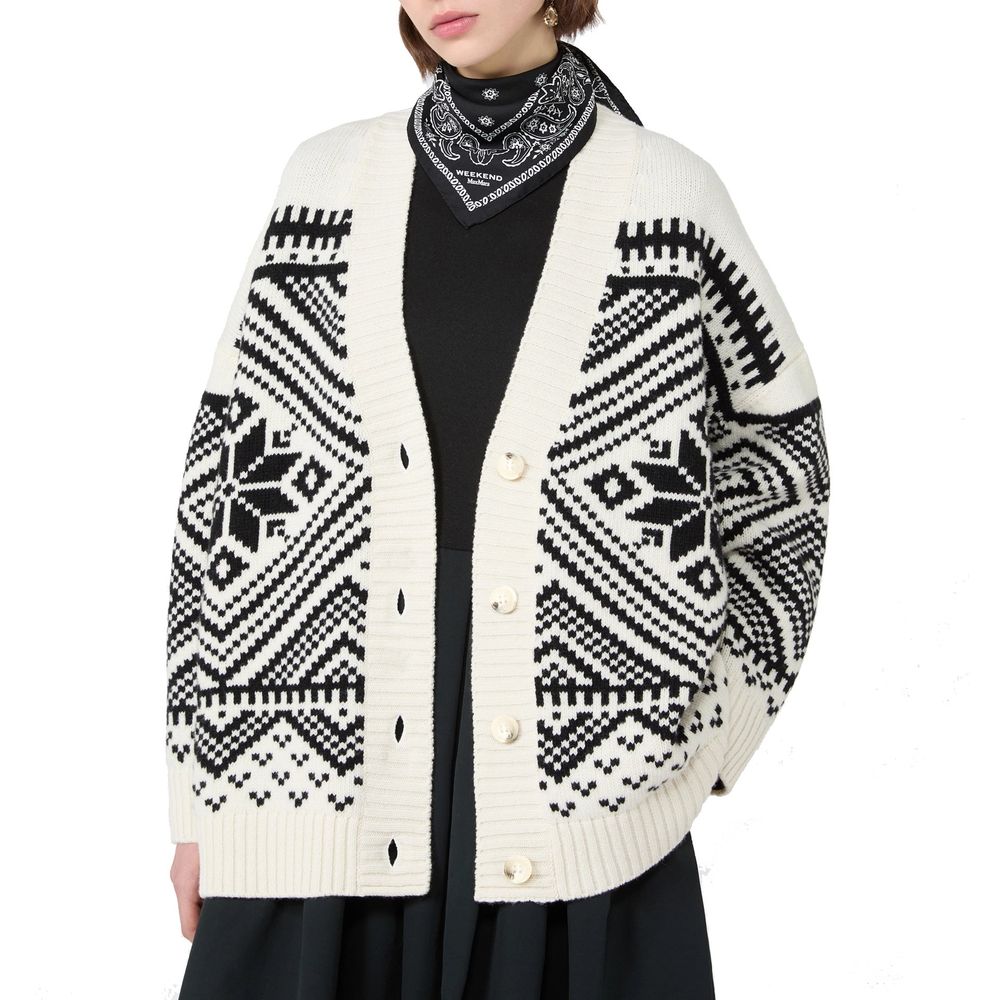 Cardigan by Max Mara for women in virgin wool white showcases a luxurious silhouette, meticulously detailed with a sophisticated and for a refined finish.