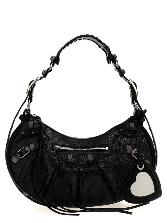 Shoulder Bag by Balenciaga for women in cotton canvas & lamb leather black & silver features a distinguished silhouette, showcasing a secure zipper and distinguished with versatile shoulder-strap, adjustable-strap & handle for a distinguished finish.