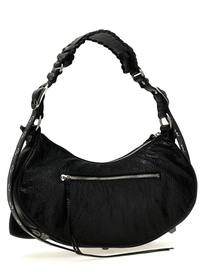 Shoulder Bag by Balenciaga for women in cotton canvas & lamb leather black & silver presents a versatile silhouette, showcasing a secure zipper and versatile with versatile shoulder-strap, adjustable-strap & handle for a sophisticated look.