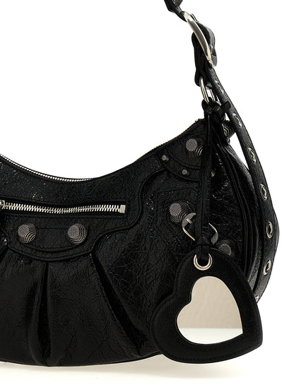 Shoulder Bag by Balenciaga for women in cotton canvas & lamb leather black & silver features a effortless sophistication silhouette, secured by a zipper with ample and versatile shoulder-strap, adjustable-strap & handle for a effortless sophistication finish.