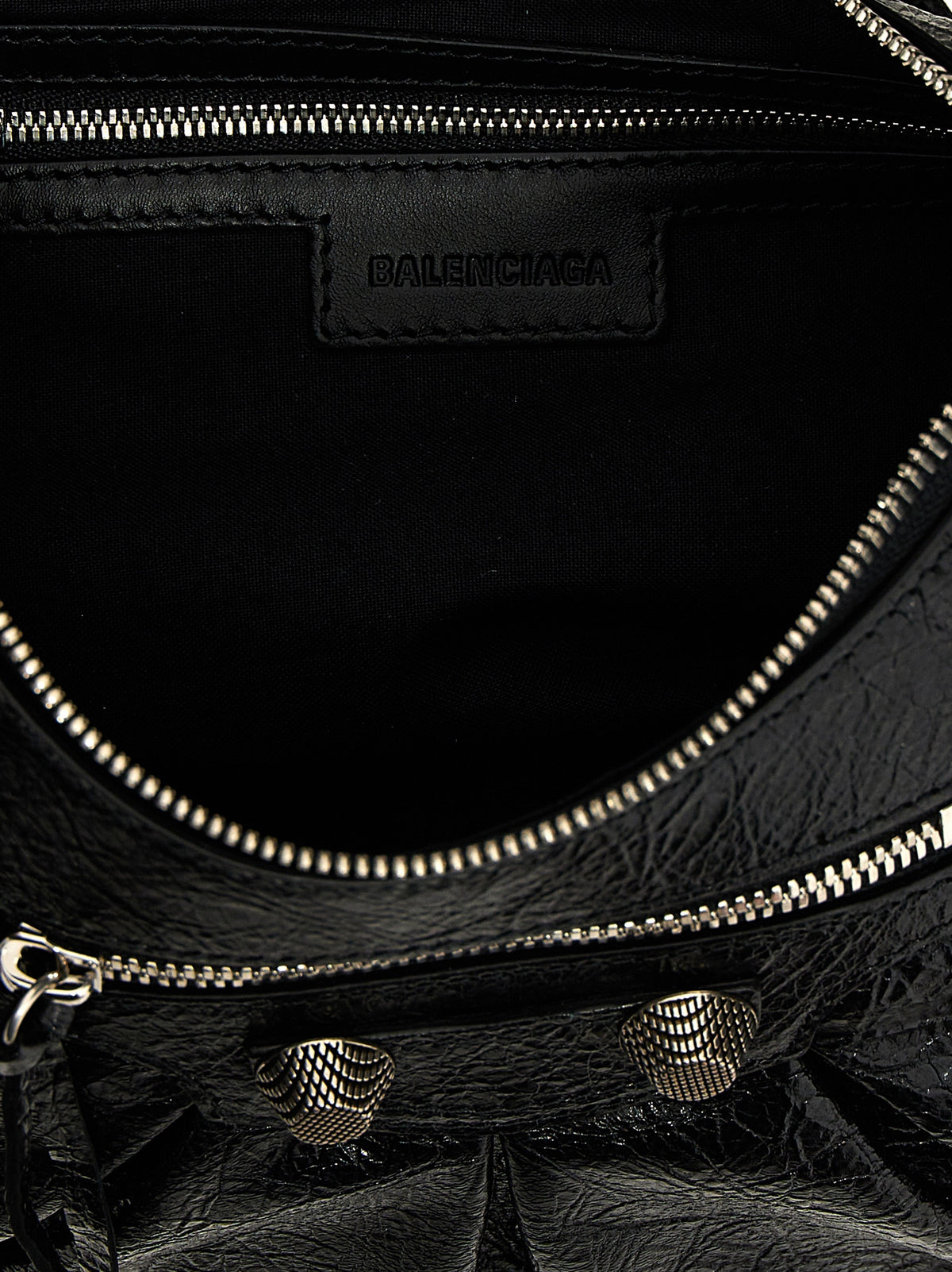 Shoulder Bag by Balenciaga for women in cotton canvas & lamb leather black & silver features an effortlessly chic silhouette with a secure zipper, ample , and versatile shoulder-strap, adjustable-strap & handle for effortlessly chic everyday luxury.