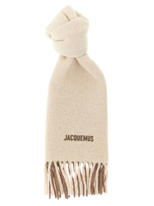 Scarf by Jacquemus for women in alpaca wool & polyamide multicolor & patterned showcases a on trend silhouette, artfully capturing the on trend essence of the Alpaca Wool & Polyamide Foulard Fringes Scarf design with a sophisticated finish.