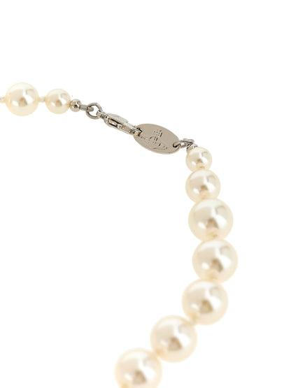 Necklace by Vivienne Westwood for women in cotton pearl & silver showcases a luminous pendant statement necklace design that defines the elegant Heart Orb Women's Silver Brass & Pearls Necklace.