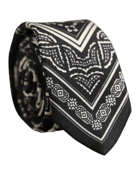 Necktie by Dolce & Gabbana for men in silk black & patterned features a distinguished silhouette, perfectly showcasing the distinguished details of Silk Necktie.