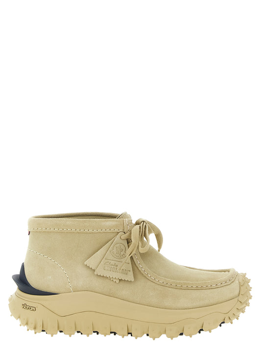 Ankle Boots by Moncler for men in suede leather beige features an dynamic silhouette, showcasing the dynamic Men's Suede Leather Ankle Boots design with its distinctive and elegant .