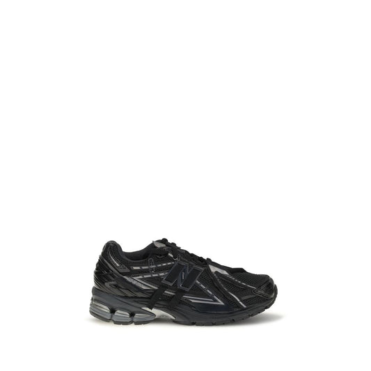 Athletic Sneakers by New Balance for women in polyamide & mesh black features an effortless chic silhouette, showcasing the signature athletic style of the Women's Athletic Polyamide & Mesh Sneakers collection with a truly effortless chic finish.