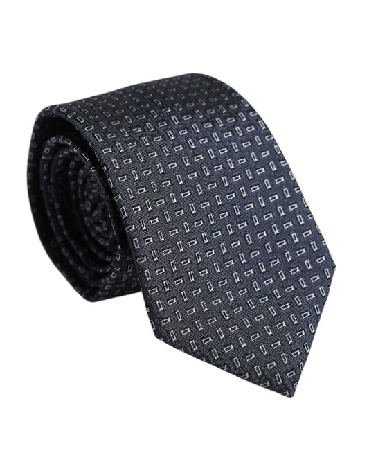 Necktie by Dolce & Gabbana for men in silk dark-blue showcases a stately silhouette, expertly detailed with a stately finish that perfectly captures the sophisticated essence of the Silk Necktie.