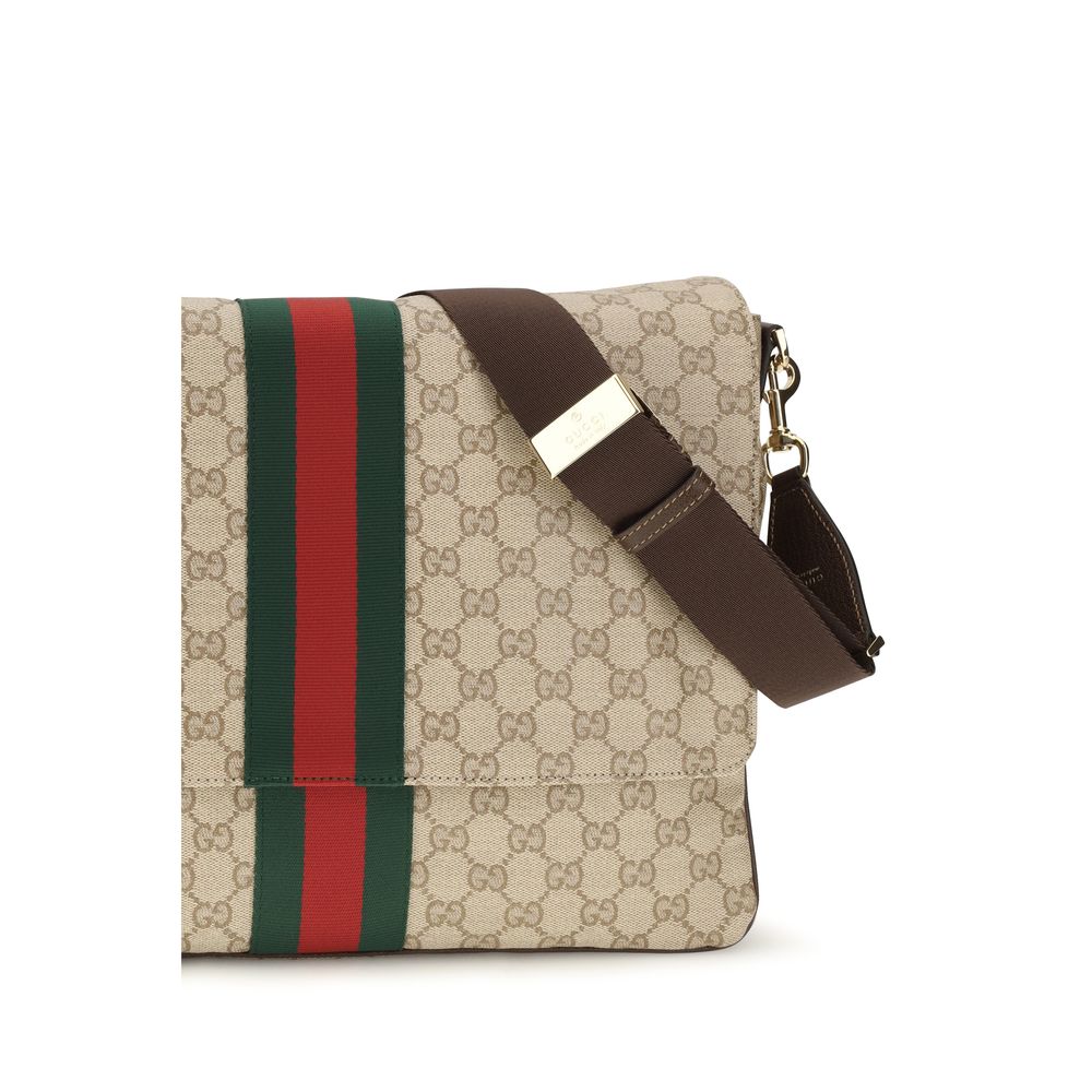 Medium 2-in-1 Shoulder & Crossbody Flap Bag by Gucci for men in leather & canvas beige & striped features a enviable silhouette, showcasing a secure flap, ample , and enviable crossbody-strap, shoulder-strap & adjustable-strap for a enviable finish.