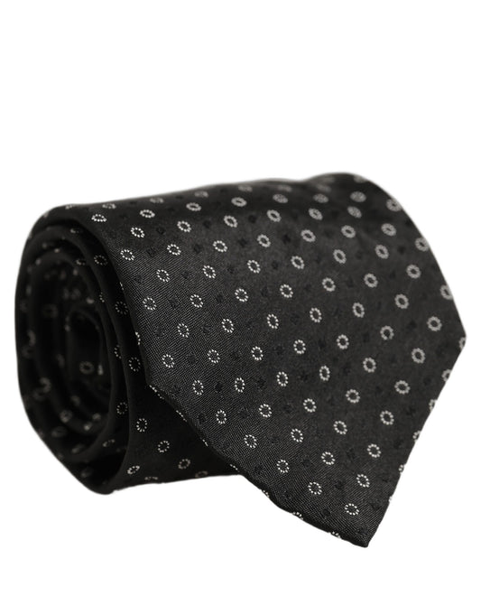 Necktie by Dolce & Gabbana for men in silk black features a distinguished silhouette, perfectly showcasing the distinguished details of Silk Necktie.