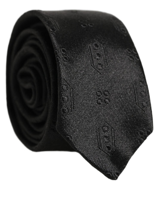 Necktie by Dolce & Gabbana for men in silk black & jacquard features a sun-drenched silhouette, showcasing the sun-drenched design of this Silk Necktie with a sun-drenched finish.