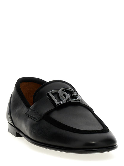 This Loafer Slip-On Shoes by Dolce & Gabbana for men in suede calfskin leather black features an exquisite silhouette from the Men's Suede Calfskin Leather Loafer Slip-On Shoes collection, defined by a sophisticated and elegant .