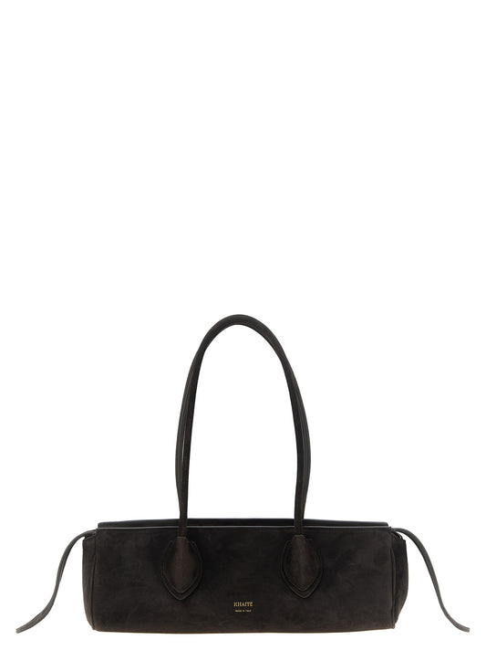 Shoulder Bag by Khaite for women in suede calfskin leather brown & gold features a effortless chic silhouette with a secure zipper, ample , and versatile shoulder-strap & handle for a effortless chic finish.