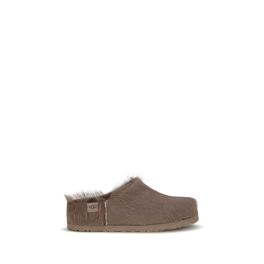 Clogs Flat Shoes by UGG for women in nubuck leather & wool brown showcases a resplendent Women's Nubuck Leather & Wool Clogs Flat Shoes aesthetic with a and .