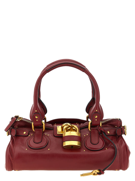 Shoulder Bag by Chloé for women in buffalo leather cotton & metal burgundy & gold features a effortless sophistication silhouette, secured by a zipper with ample and versatile shoulder-strap & handle for a effortless sophistication finish.