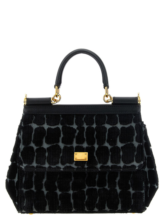 Small Flap Handbag by Dolce & Gabbana for women in silk velvet cotton & calf leather animal, black, gray & print features an refined silhouette, showcasing a secure snap, flap, magnetic & button, ample , and versatile shoulder-strap, handle & detachable-strap for a sophisticated refined aesthetic.