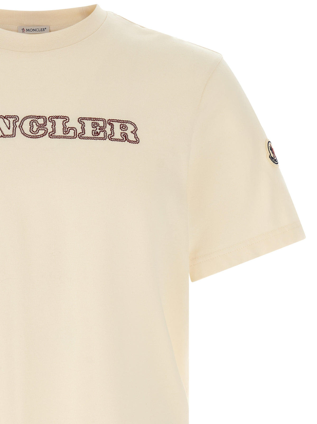 T-Shirt by Moncler for men in cotton felt ivory, white & signature showcases a unassuming silhouette, artfully detailed with a refined crew neckline and unassuming for a sophisticated, contemporary look.
