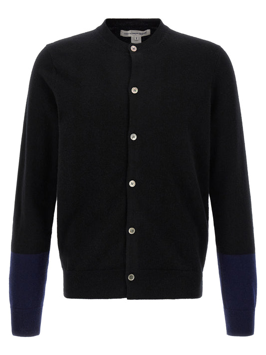 Cardigan by Comme Des Garçons for men in wool black, navy & pearl features an impeccable silhouette, showcasing a sophisticated round neckline and detail for a truly impeccable finish.