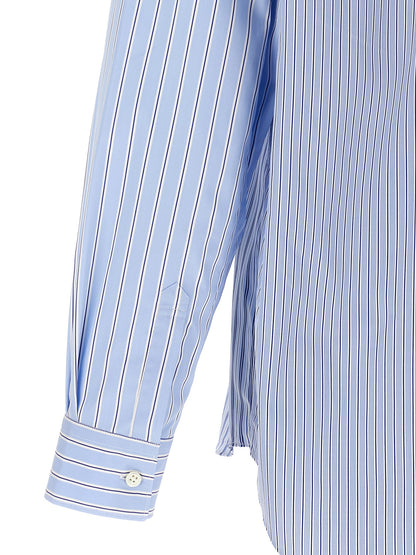 Shirt by Comme Des Garçons for men in cotton blue, patterned, patchwork & striped features an architectural silhouette with a refined and elegant for a architectural look.