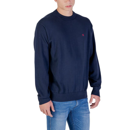 Sweatshirt by Calvin Klein Jeans for men in cotton blue showcases a slouchy chic silhouette, artfully detailed with a slouchy chic crew neckline and for a slouchy chic finish.