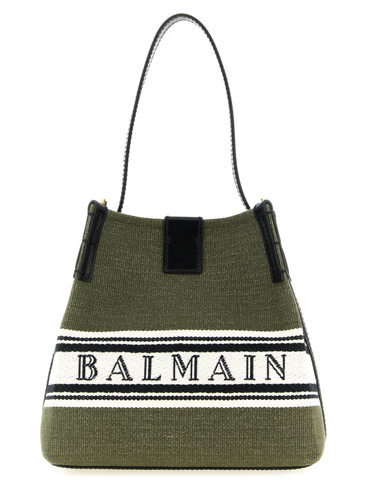 This Bucket Handbag by Balmain for women in calf leather canvas cotton & polyester and bicolour & green presents a sculptural silhouette featuring a secure magnetic, ample , and versatile shoulder-strap, adjustable-strap & handle for a sculptural finish.