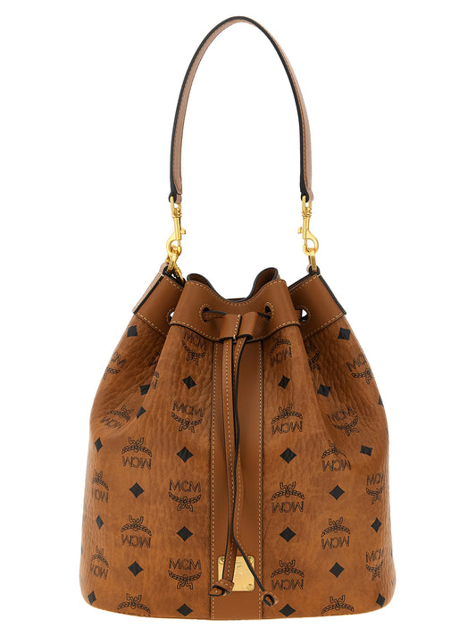 Bucket Pouch Shoulder Bag by MCM for women in canvas microfiber suede & leather brown, gold, patterned & monogram features a effortless chic silhouette with a secure zipper & drawstring, ample , and versatile shoulder-strap, handle, adjustable-strap & detachable-strap for a effortless chic finish.