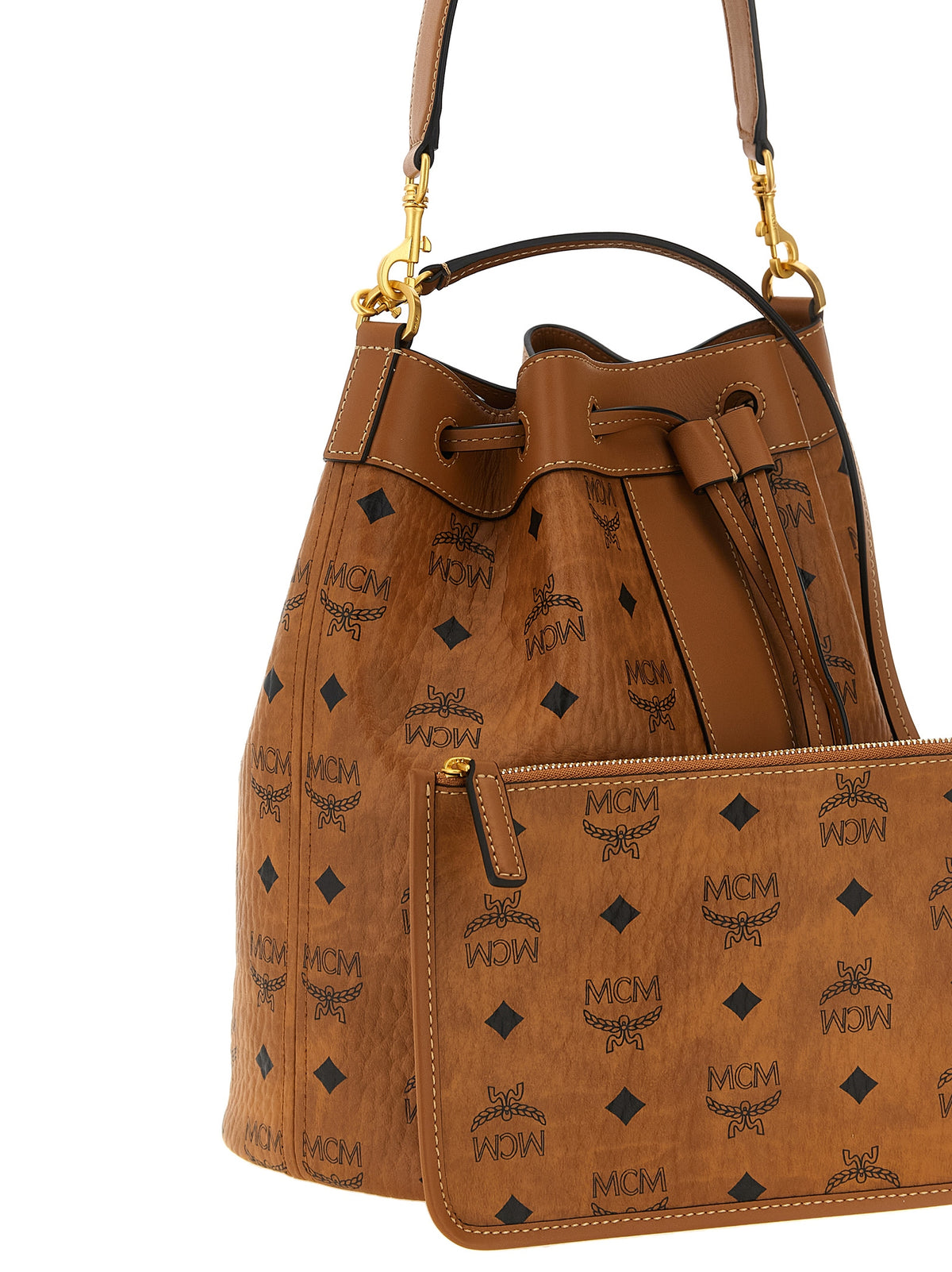 Bucket Pouch Shoulder Bag by MCM for women in canvas microfiber suede & leather brown, gold, patterned & monogram features an effortlessly chic silhouette with a secure zipper & drawstring, ample , and versatile shoulder-strap, handle, adjustable-strap & detachable-strap for effortlessly chic everyday luxury.